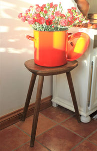Red and yellow enamelware bin